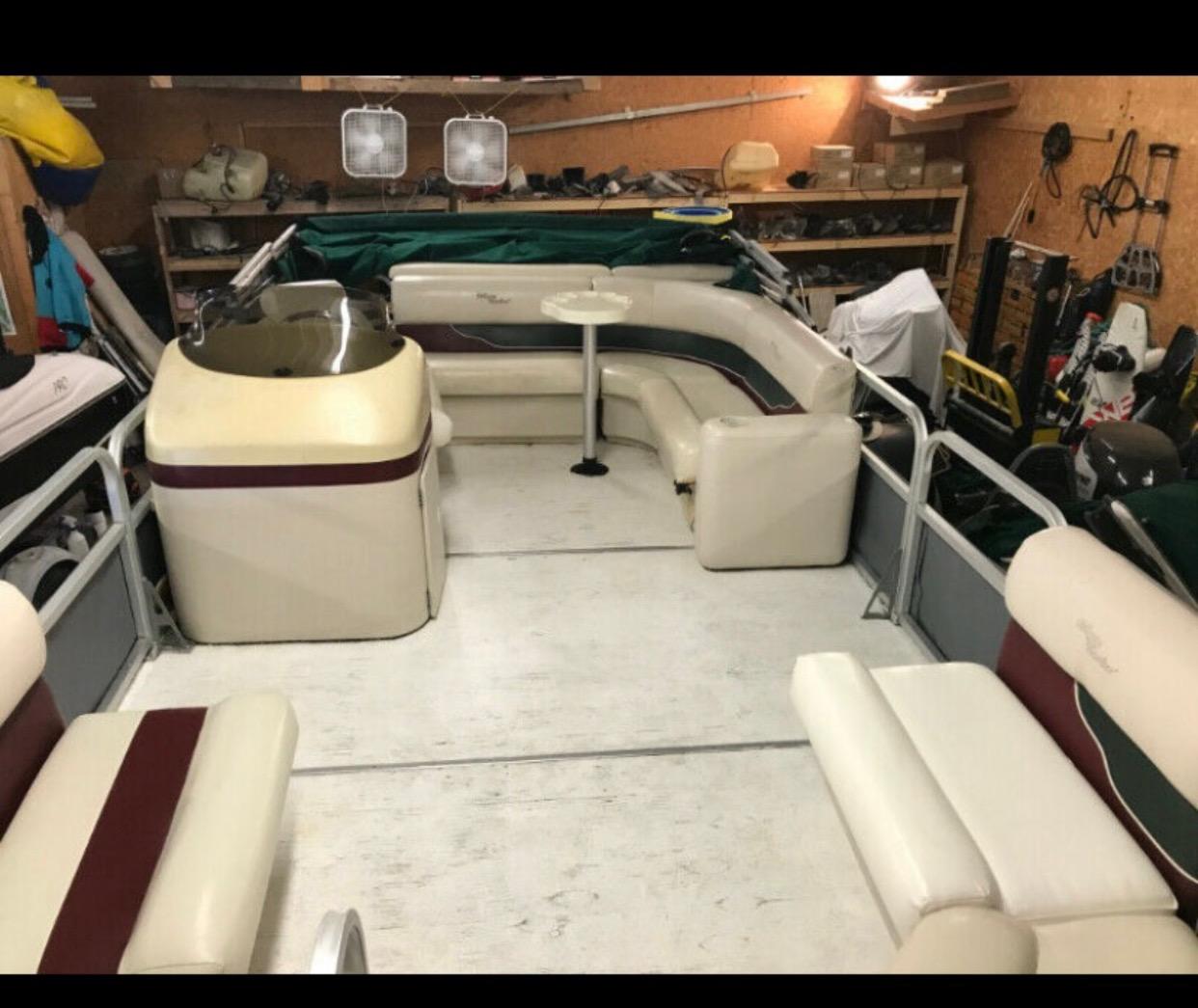 The same reupholstered pontoon boat seating installed on the boat
